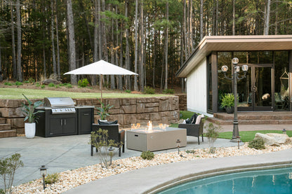 Stoll Industries outdoor kitchen with adjacent fire table